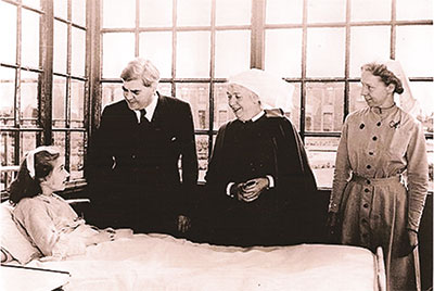 Bevan seeing a patient on a ward